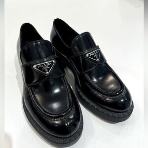 Prada black leather loafers